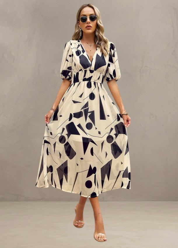 ASTELLA | FLATTERING FLORAL MIDI DRESS